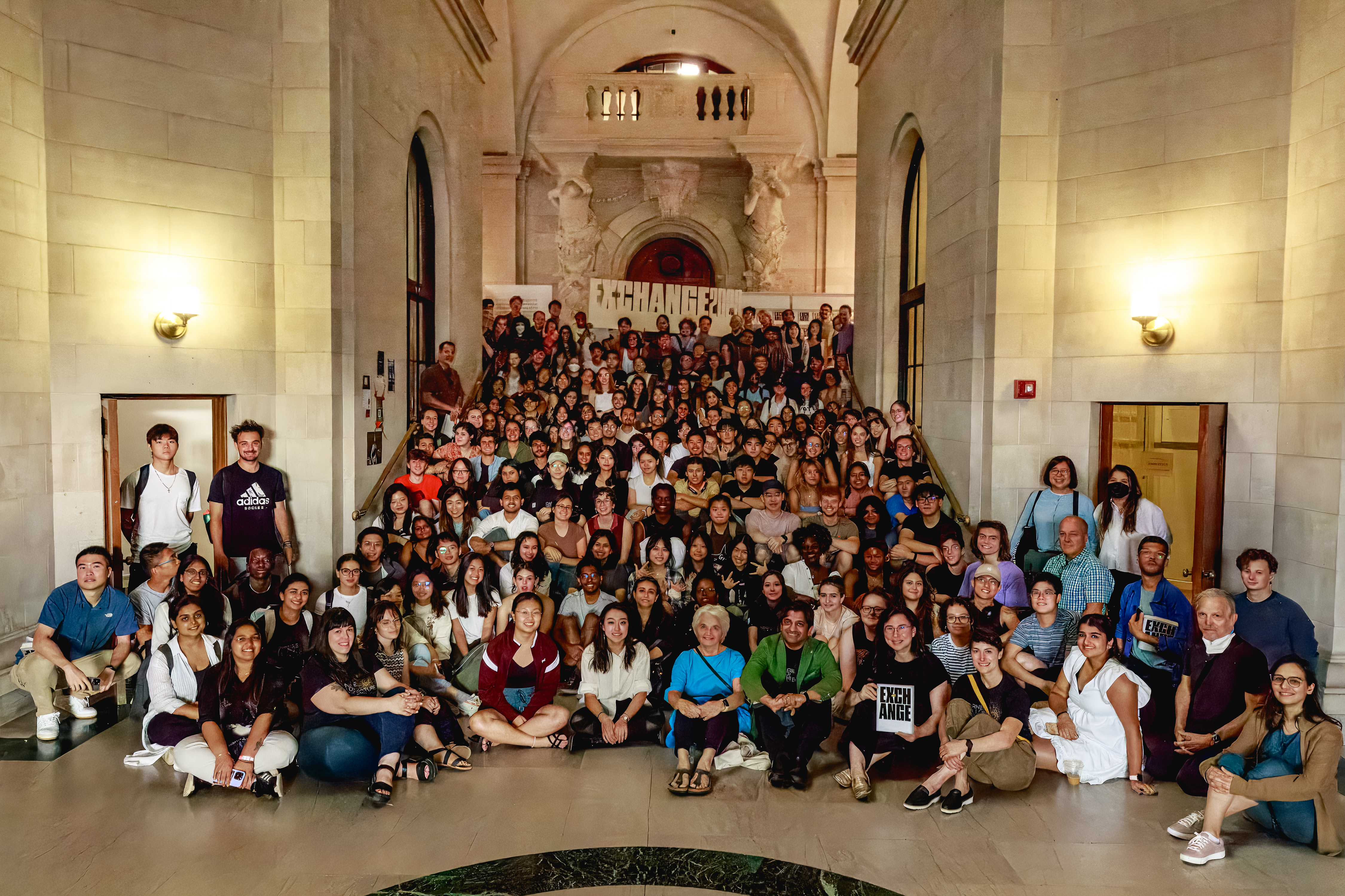 Students, faculty and staff gather for the annual all-school photo during the 2023 EX-CHANGE launch event.