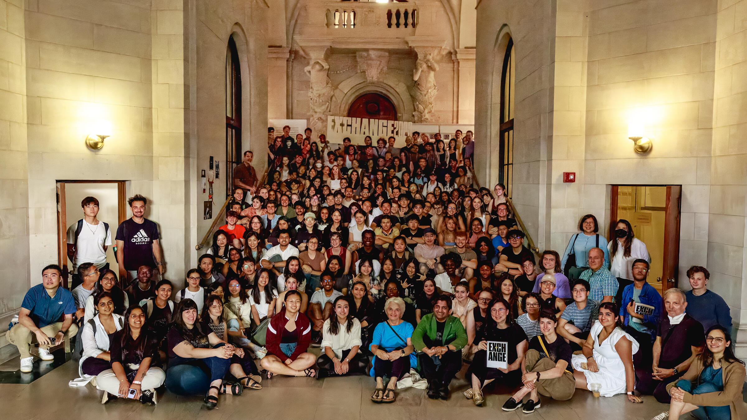 Students, faculty and staff gather for the annual all-school photo during the 2023 EX-CHANGE launch event.